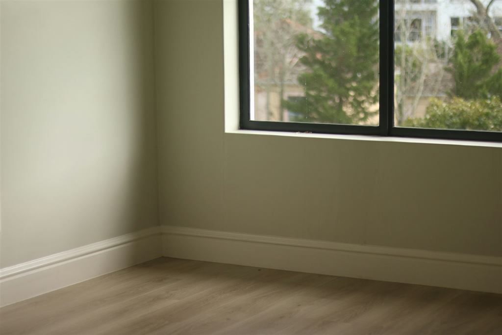 Empty bedroom before staging
